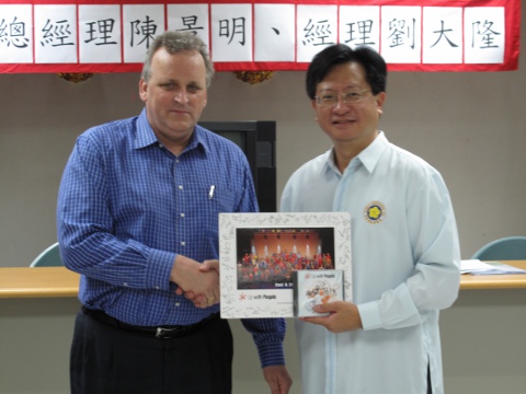 Up With People give Souvenir to Mr. Wayne Chi